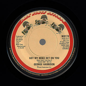 George Harrison - Got My Mind Set On You / Lay His Head (Dark Horse W8178 / 928 178-7) – label (var. three horses), side 1